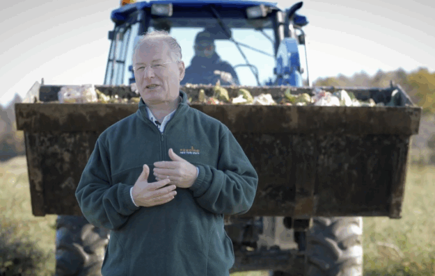 Dan Egan in front of Tractor